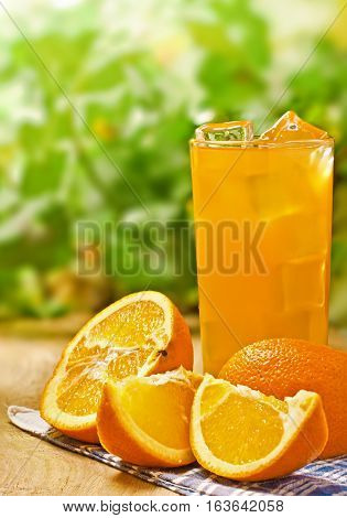 Orange juice on the wood surface outdoor