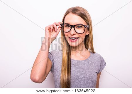 Happy Blonde Girl In Glasses On White Background