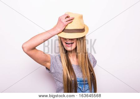 Happy Girl In Cap On White. Summer Holiday Mood