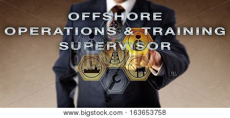 Corporate human resources manager in blue suit is activating OFFSHORE OPERATIONS & TRAINING SUPERVISOR on a virtual computer screen. Oil and gas industry concept and industrial recruitment metaphor.