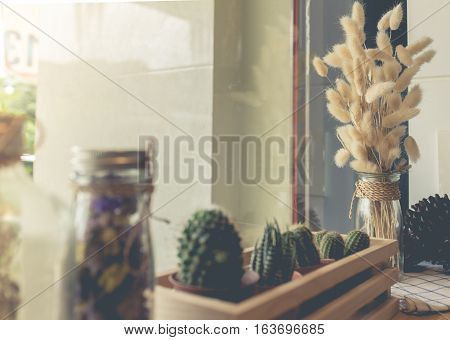Dried flower in vase Bouquet of dried flowers in vase. Dried flower for interior decoration. Interior object(vintage effect, selective focus)