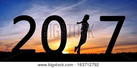 silhouette of a girl running, step forward silhouette of a girl making a step before, 2017 years while celebrating new EAP, 2017, happy girl.
