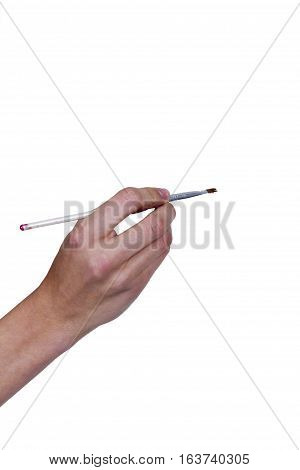 Brush for greasepaint in a hand on a white background