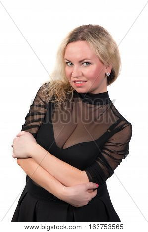 Sexy blonde woman with big breasts in a transparent dress isolated on white background. Attractive woman with large boobs and curly hair.