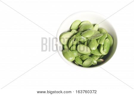 Parkia speciosa in cup on white background ( bean petai twisted cluster stink bitter sato )