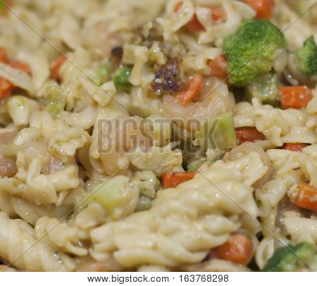 Close up of shrimp and broccoli pasta
