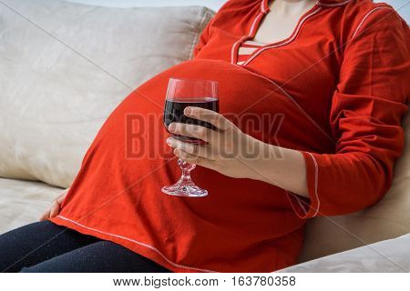 Drinking Alcohol In Pregnancy. Pregnant Alcoholic Woman Is Drink
