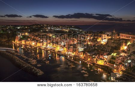 Corricella village on Procida island at night Italy