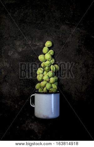 Wasabi Peanuts On Black Background
