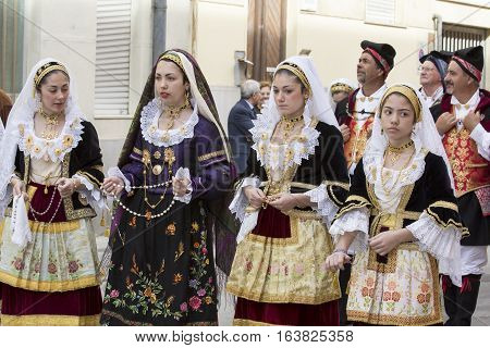 CAGLIARI, ITALY - May 1, 2014: 358 Religious Procession of Sant'Efisio - Sardinia - group of beautiful girls in traditional Sardinian costume