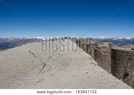 The summit of Mont Chaberton with ruined artillery turrets