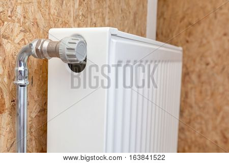supply to the radiator in the bathroom close up