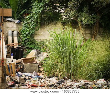 splattered scrap heap at backyard photo taken in Semarang Indonesia java