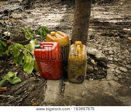 Petroleum Jerry Can abandoned in a garden photo taken in Semarang Indonesia java