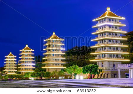 View of traditional oriental pagodas at night