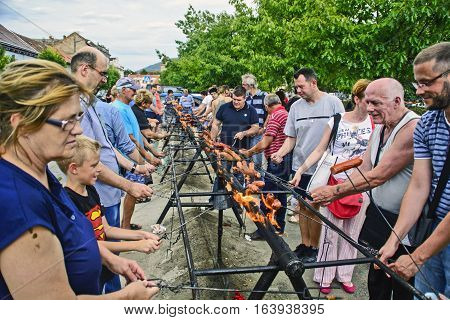 Vrsac Serbia September 17 2016.The traditional street roast sausage on fire during the manifestations.