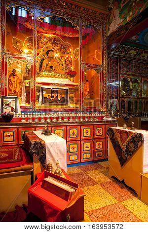 REWALSAR, INDIA. 2 June 2009:   The sacred Buddha statue and gold jewelry Buddhist monastery  Drikung Kagyud Gompa. Rewalsar, district Mandi, Himachal Pradesh, district of Kangra, India.