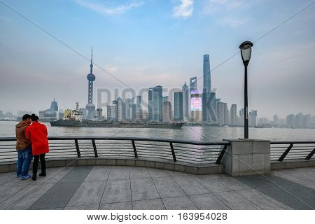 The Bund or Waitan is a waterfront area in central Shanghai China