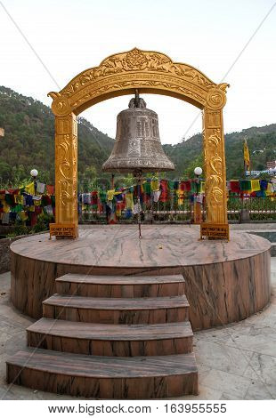 REWALSAR, INDIA. 2 June 2009:   Buddhist prayer bell in Rewalsar. Rewalsar, district Mandi, Himachal Pradesh, district of Kangra, India.