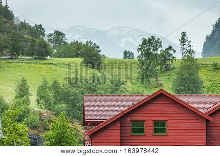 Wooden Cottage In The Valley.