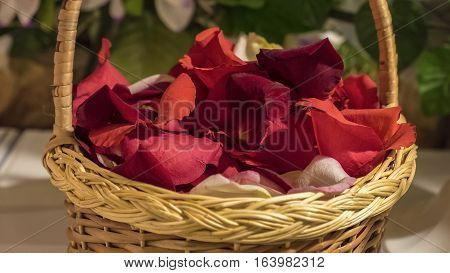Rose petals in a cute wicker basket