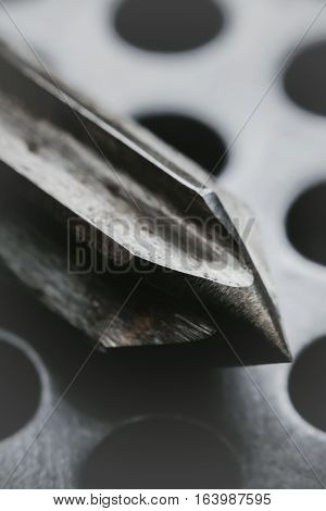 Drill reamer at factory workshop. Selective focus