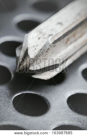 Drill reamer at factory workshop. Selective focus