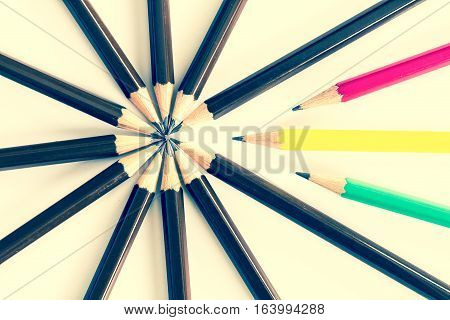 brown wooden pencil arrange as circular with one of different pencil try to close the gap on white background un matching and competition concept
