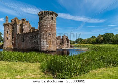 Shearington, Scotland, Uk - June 18, 2012: Long Shot Of Southwest Tower And Two Wall Of Ruined  Brow