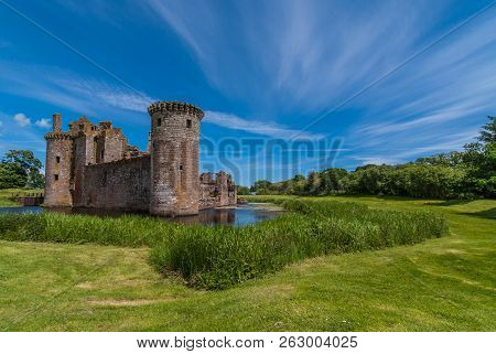 Shearington, Scotland, Uk - June 18, 2012: Very Long Shot Of Southwest Tower And Two Wall Of Ruined 