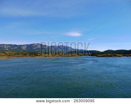Beautiful Blue Sky And Water Of Yukon River