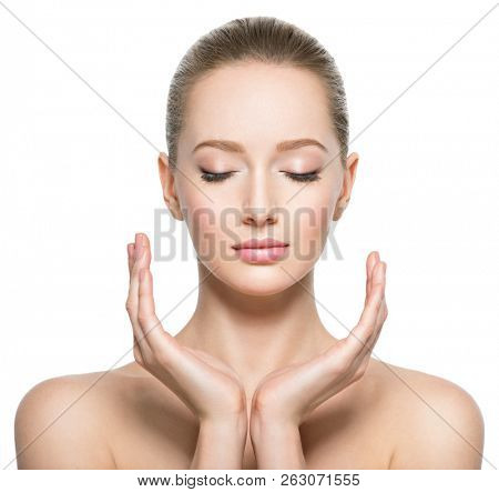 Beautiful perfect face of young caucasian woman with  health skin  - isolated on white.  Skin care concept. Front portrait.