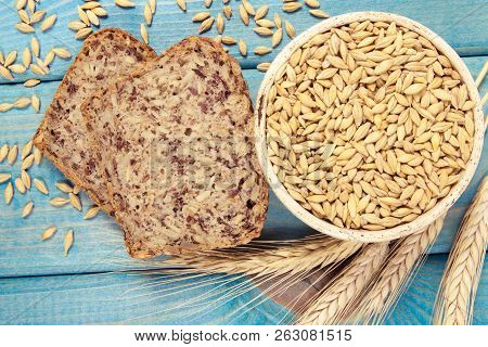 Multi-grain Bread On A Wooden Background. Healthy Food Concept.