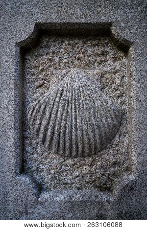 Camino Santiago stone shell sign in Combarro Way of Saint James Pontevedra Galicia Spain