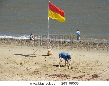 Norfolk, England - 24 May 2009 : People Spending Time On Beach In Mundesley