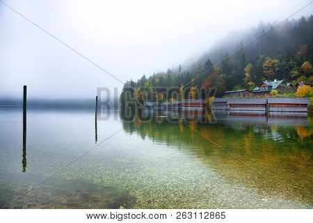 Misty Morning On Altaussee Village.misty Autumn Scene In The Morning. Mirror Reflection. Location: R