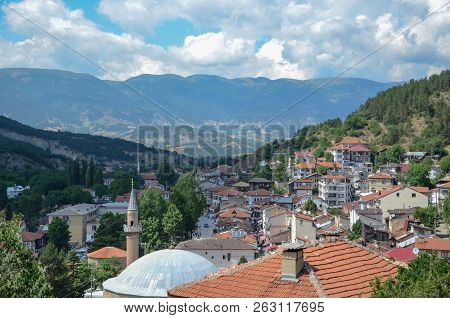 Historical Old White  Wooden Houses Of Mudurnu Among Mountains And Trees.