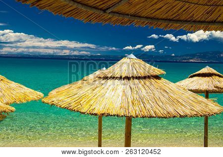 View Of Blue Azure Paradise Water Of Toroneos Kolpos Gulf, Blue Sky, White Clouds Over Sithonia Peni