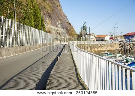 Photo Of A White Riling With (sun And Shadow), Blue Sky And Several Colours