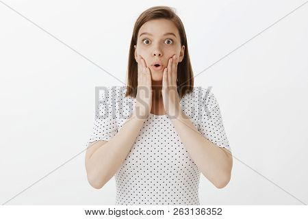 Girl Likes Sharing Rumors And Gossips, Standing Impressed And Surprised, Holding Palms On Cheeks, Dr