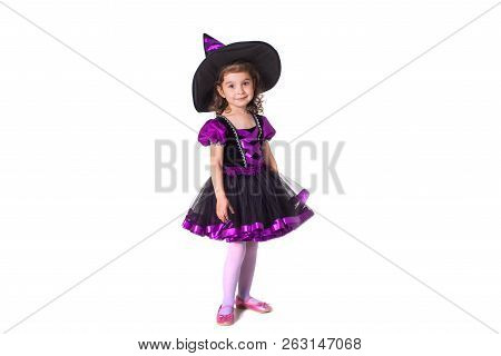 Little Girl Witch In Black Hat. Isolated.