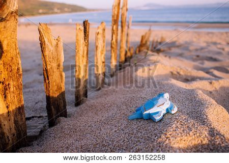Blue Wooden Turtle On The Beach. 
