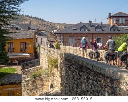 Pilgrims On The Roman Bridge Over The Meurelo River - Molinaseca, Castile And Leon, Spain, 25 Septem