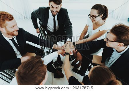 Collective Work. Group Disabled Worker. Workers With Disabilities. Business Meeting. Business Suits.