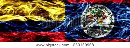 Colombia Vs Belize, Belizean Smoke Flags Placed Side By Side. Thick Colored Silky Smoke Flags Of Col