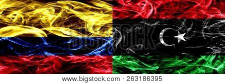 Colombia Vs Libya, Libyan Smoke Flags Placed Side By Side. Thick Colored Silky Smoke Flags Of Colomb