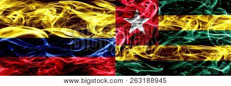 Colombia Vs Togo, Togolese Smoke Flags Placed Side By Side. Thick Colored Silky Smoke Flags Of Colom