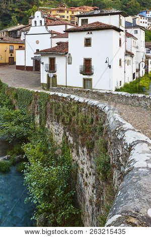 Traditional Village In Asturias With Stone Bridge, Cangas Narcea. Spain