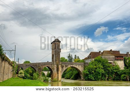 A Medieval Bridge Over River Gave De Pau In Orthez - France