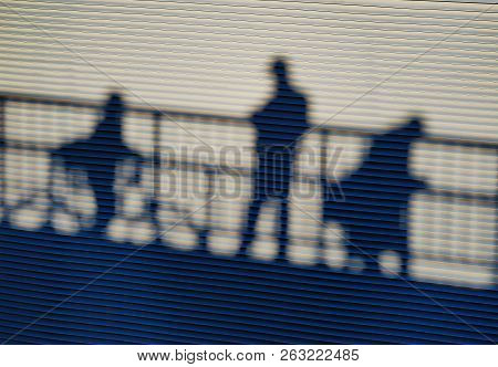 People Silhouettes On The Bridge Sunny Day